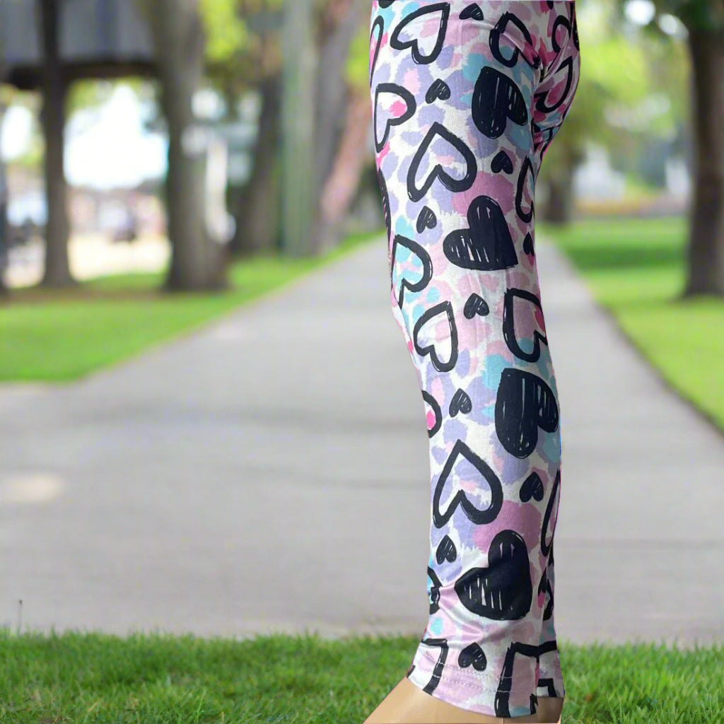 Leggings with heart pattern on a pink background