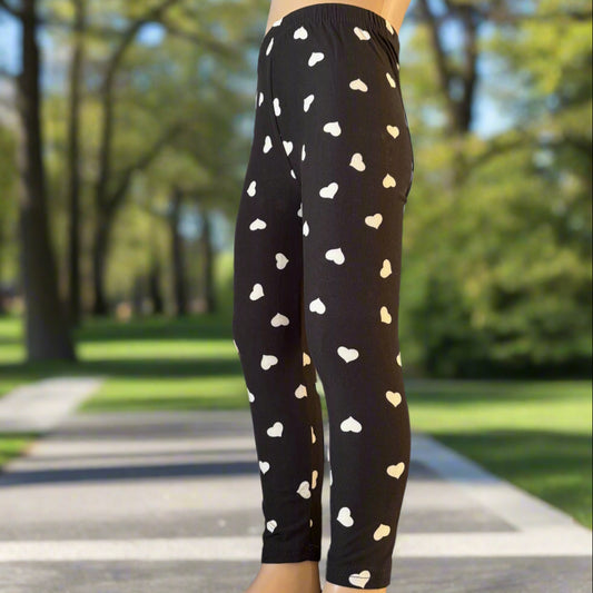 Black leggings with white hearts design