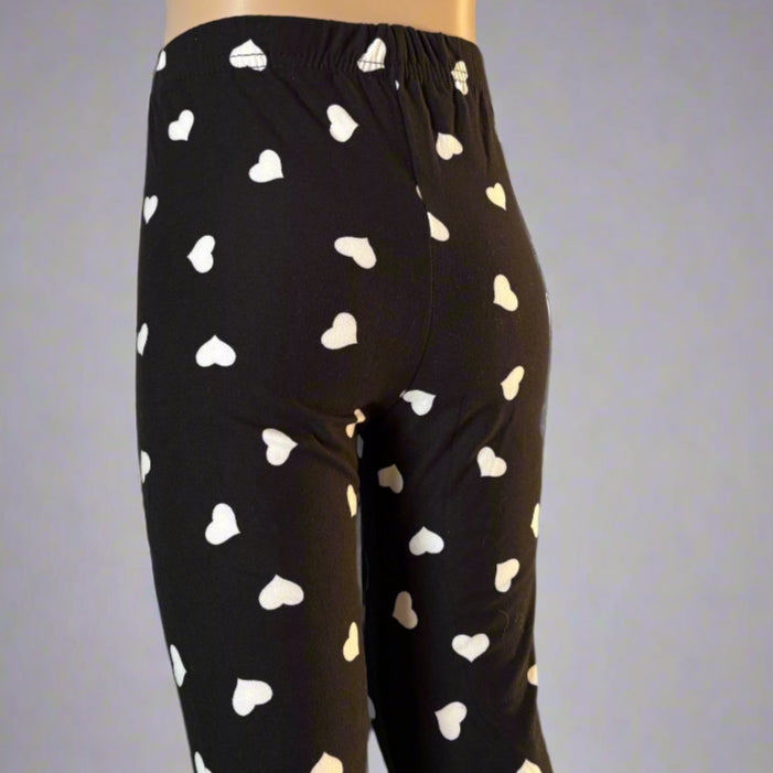 Black leggings with white hearts design