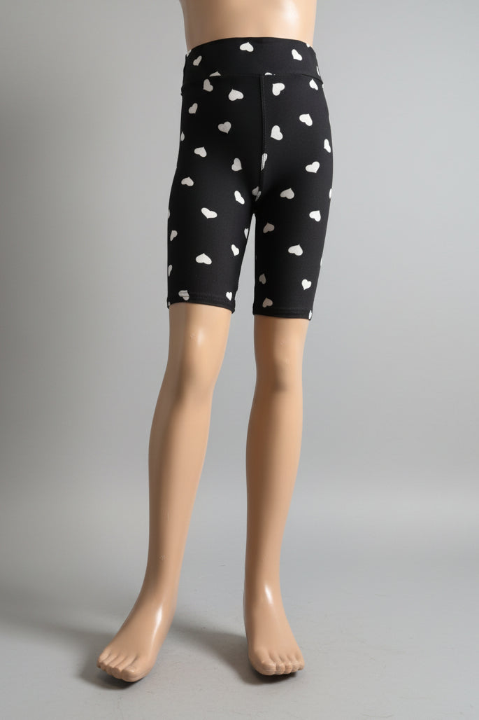 Black soft touch shorts with white hearts