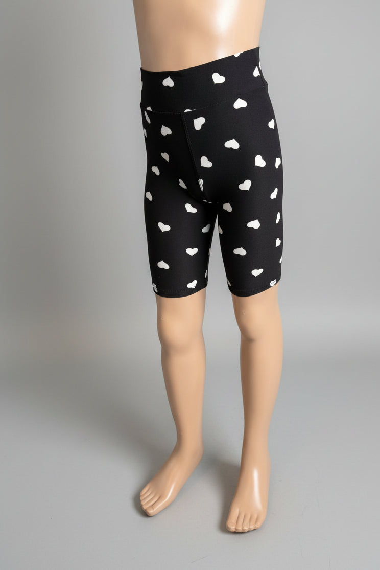 Black soft touch shorts with white hearts