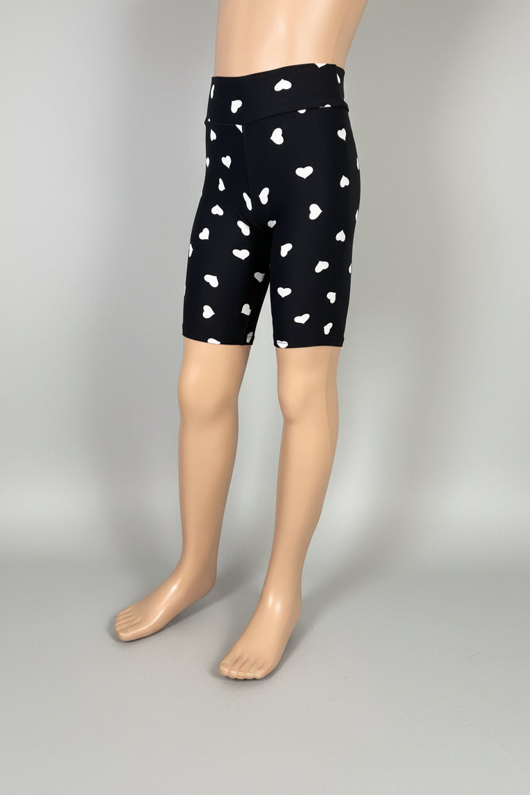 Black soft touch shorts with white hearts
