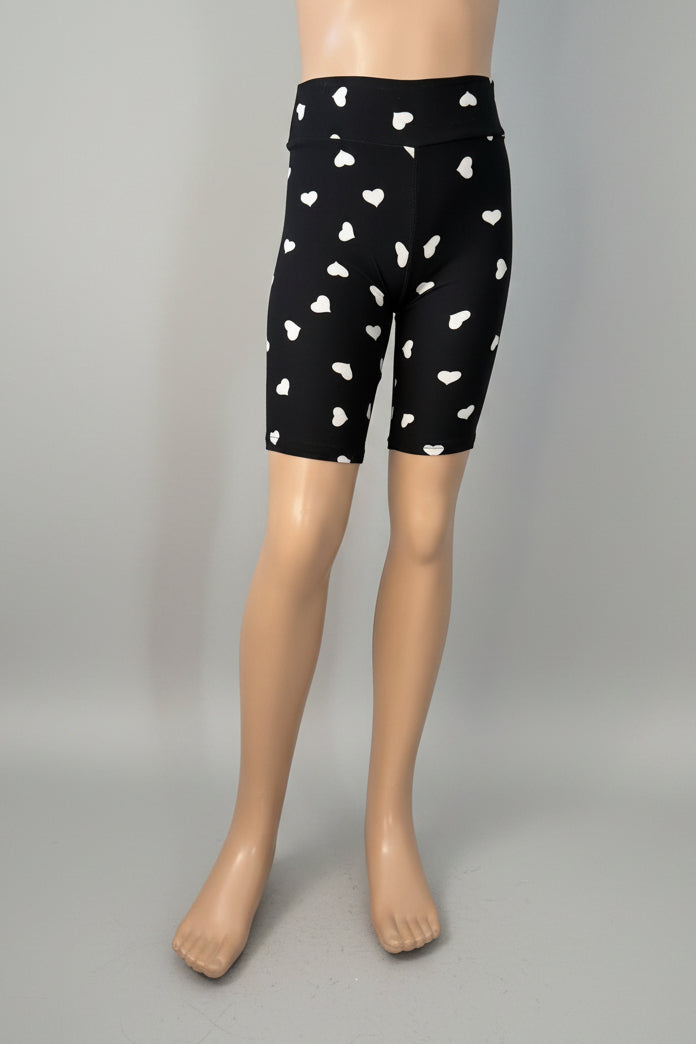 Black soft touch shorts with white hearts