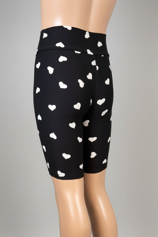 Black soft touch shorts with white hearts