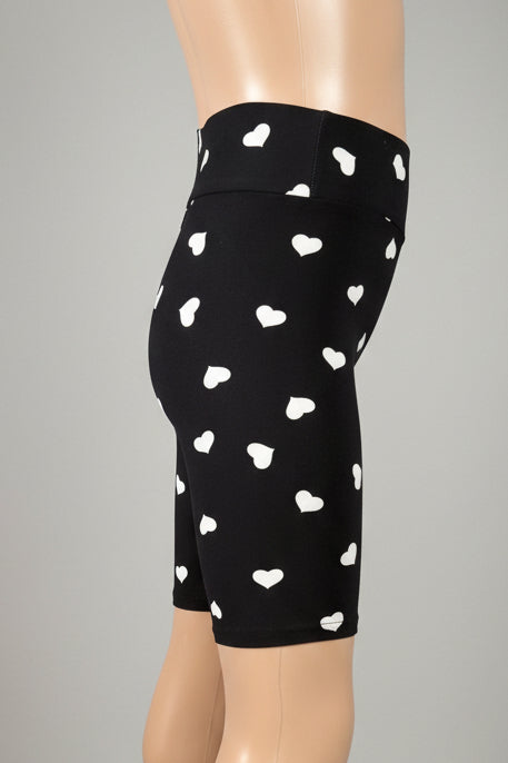 Black soft touch shorts with white hearts