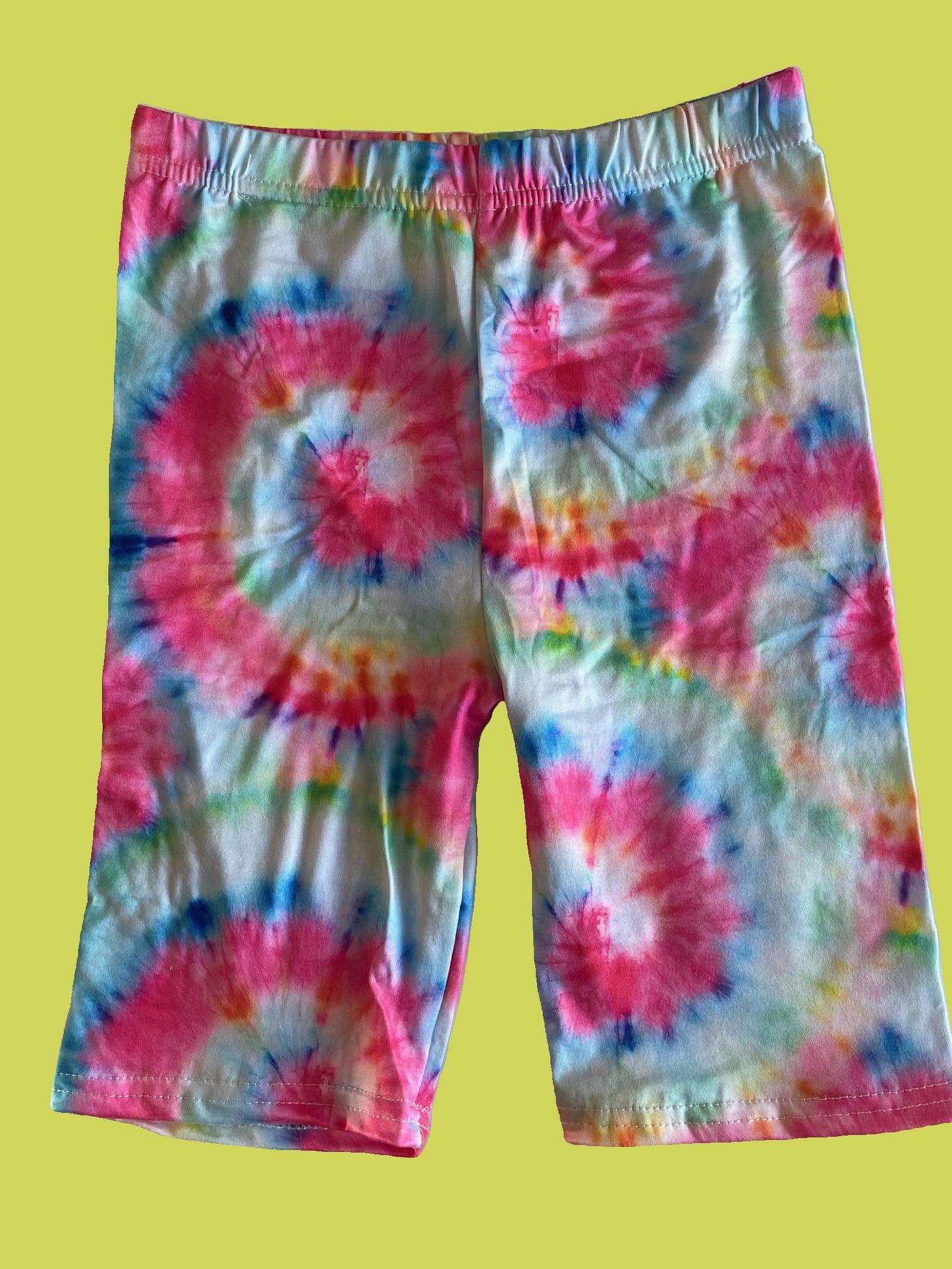 Bright tie-dye Bermuda shorts