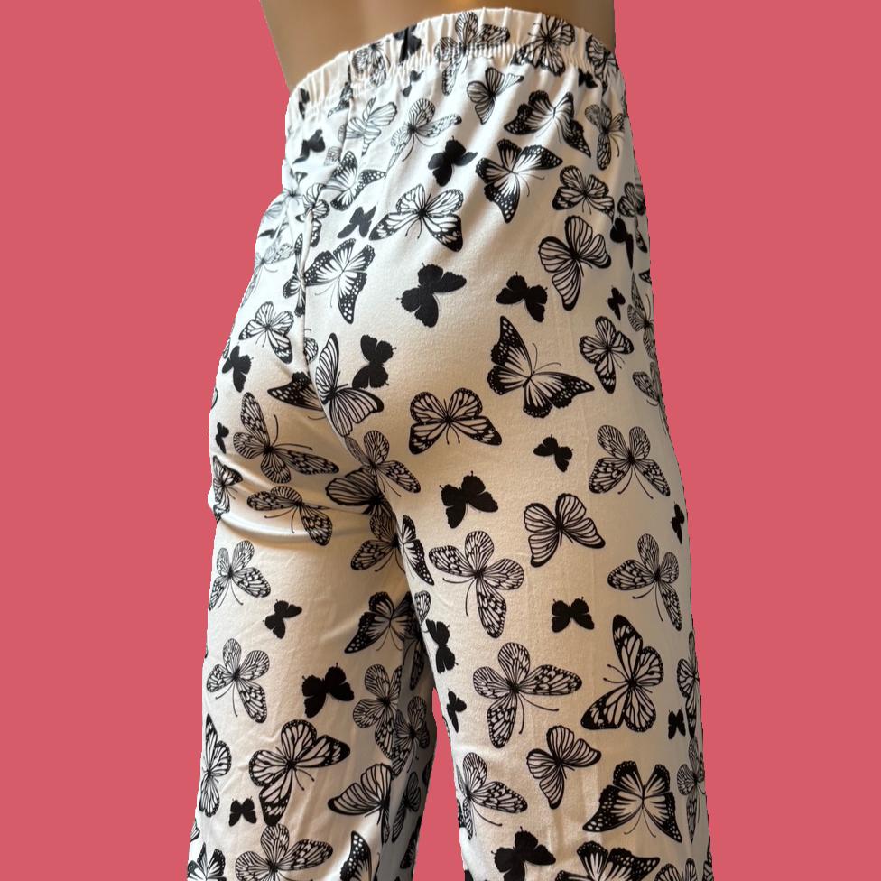 White leggings with black butterfly design, full length