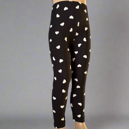 Black leggings with white hearts design