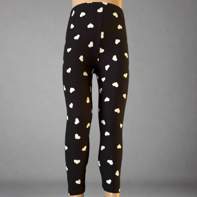 Black leggings with white hearts design
