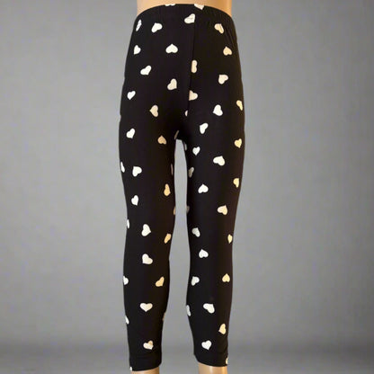 Black leggings with white hearts design