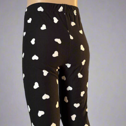 Black leggings with white hearts design
