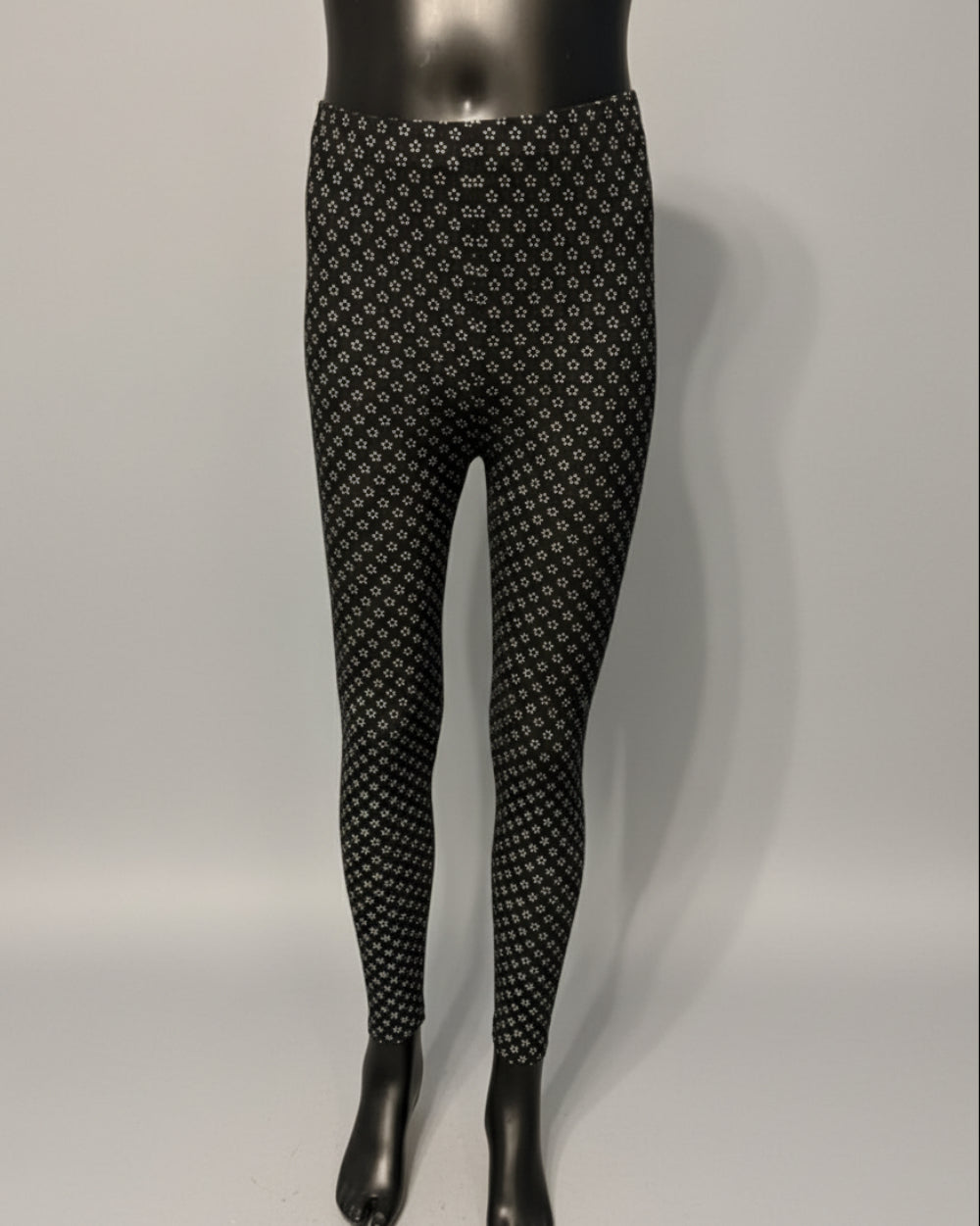 Black leggings with tiny white flowers design