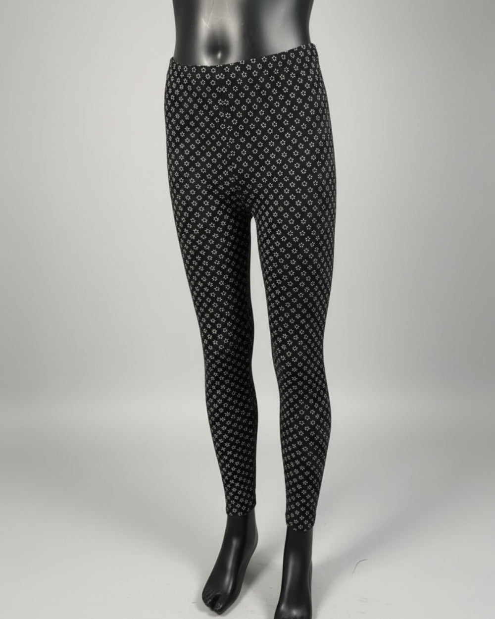 Black leggings with tiny white flowers design