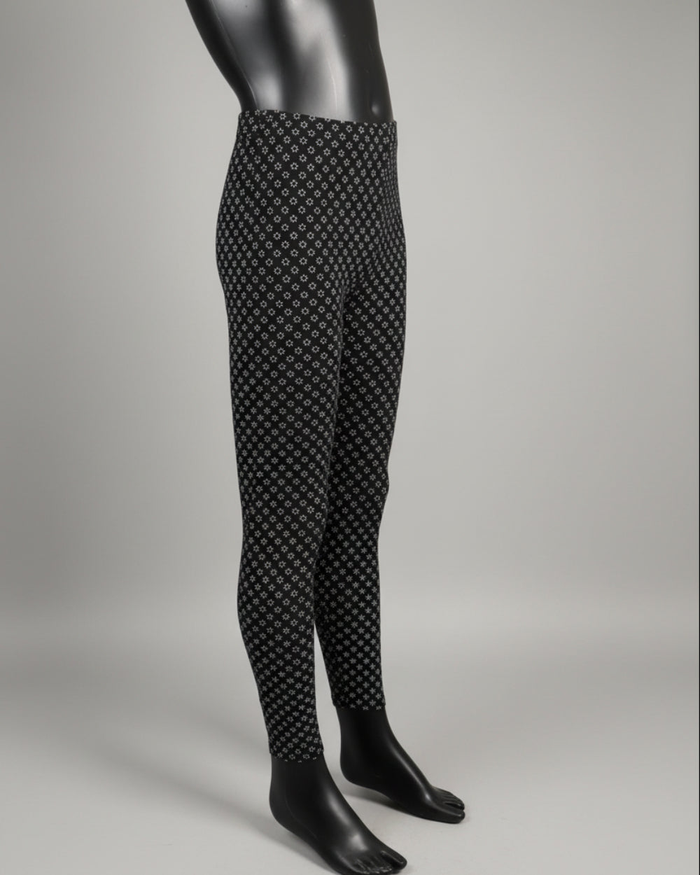 Black leggings with tiny white flowers design