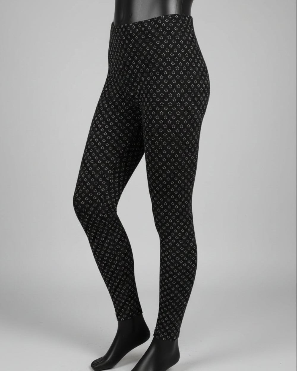 Black leggings with tiny white flowers design