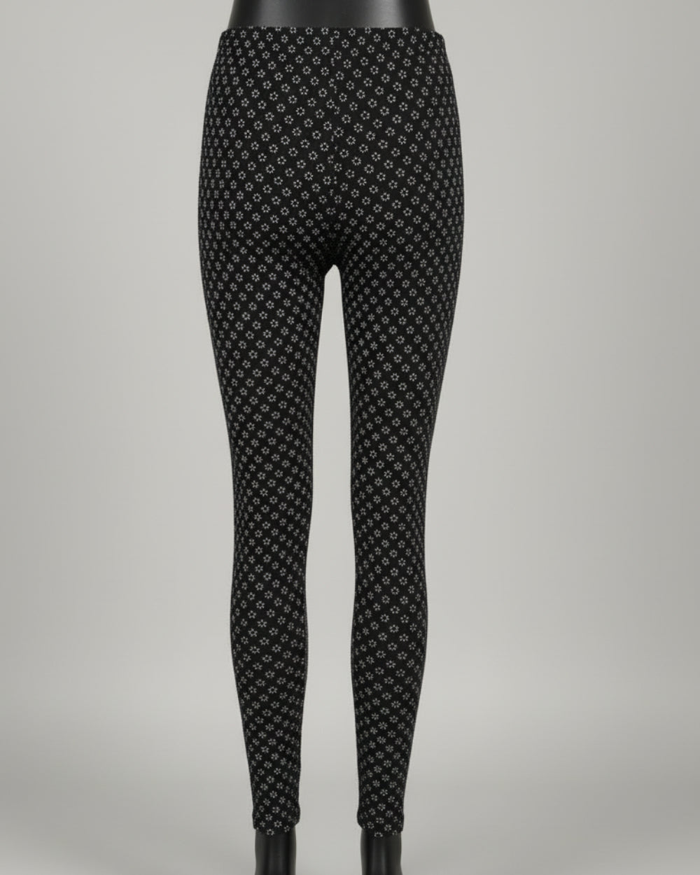 Black leggings with tiny white flowers design