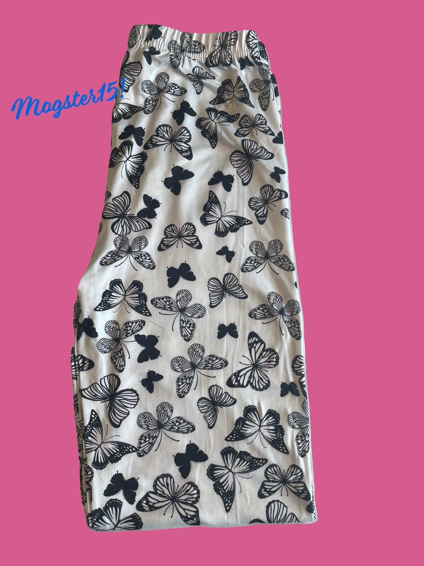 White leggings with black butterfly design, full length